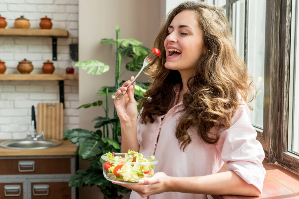 woman eating a salad