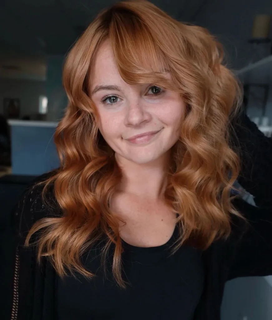 Curly Ginger Hair And Curtain Bangs