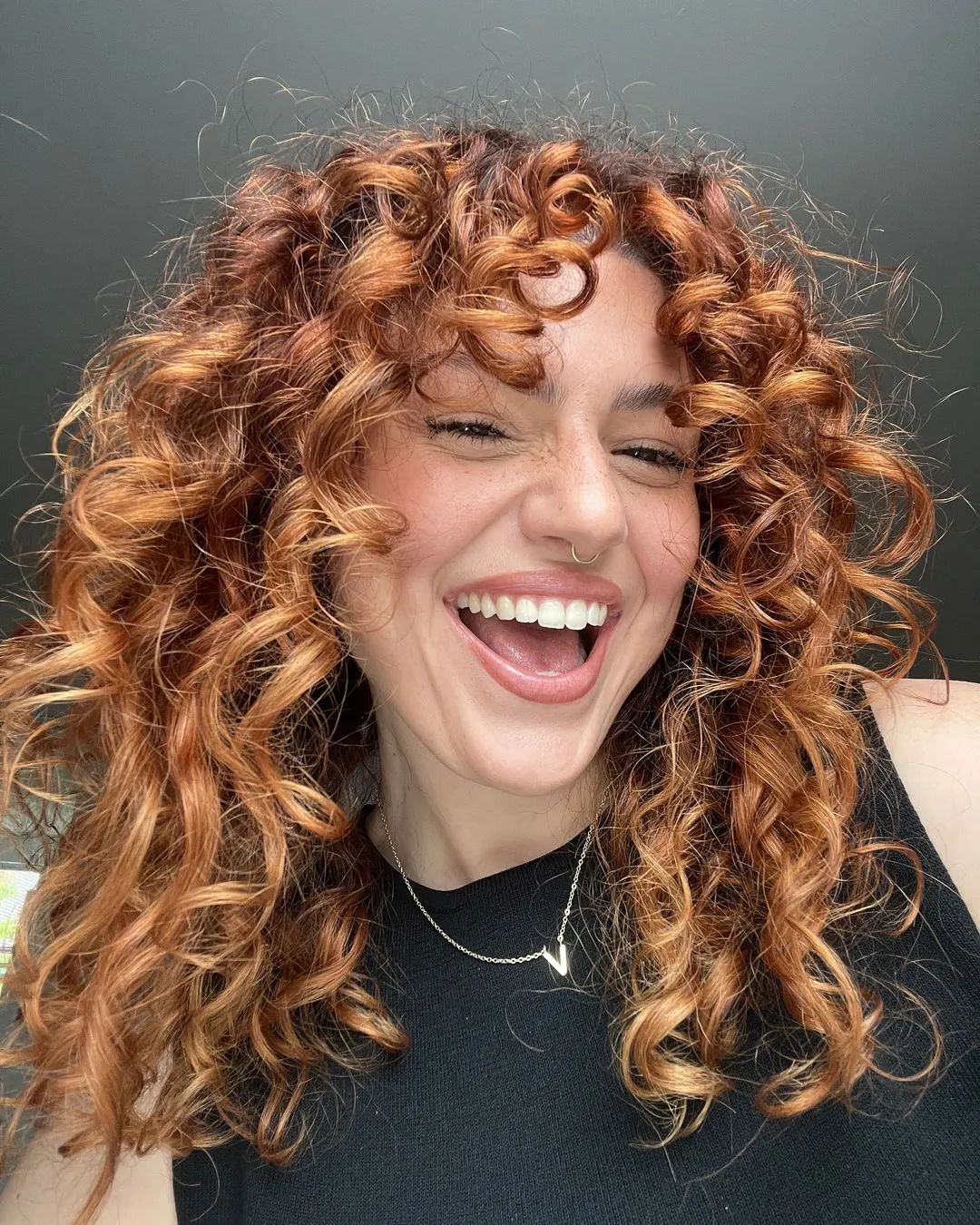 22 Stunning Curtain Bangs Ideas for Curly-Haired Women to Rock Your Look